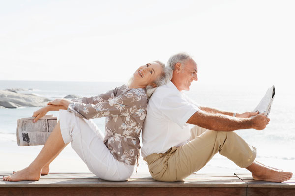 Elderly couple sitting on a deck